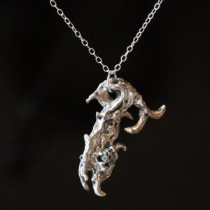 Astrological talismans of constellation Cetus in solid sterling silver with fossilized coral by Sword + Scythe