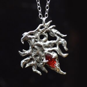 Astrological talisman of fixed star Regulus featuring marquise garnet set in solid sterling silver by Sword + Scythe