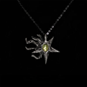 The Wormwood Star ritual charm featuring peridot set in solid sterling silver by Sword + Scythe