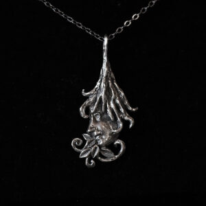 Devotional charm of Saint Hildegard of Bingen in solid sterling silver by Sword + Scythe