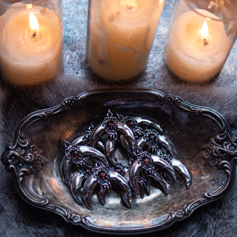 Protective amulet of the Divine Mother with Wolves featuring baltic amber in solid sterling silver Wolfmother by Sword + Scythe
