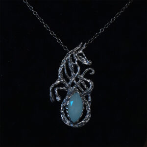 Astrological talismans of fixed star Sirius featuring aquamarine above wormwood and juniper in sterling silver by Sword + Scythe